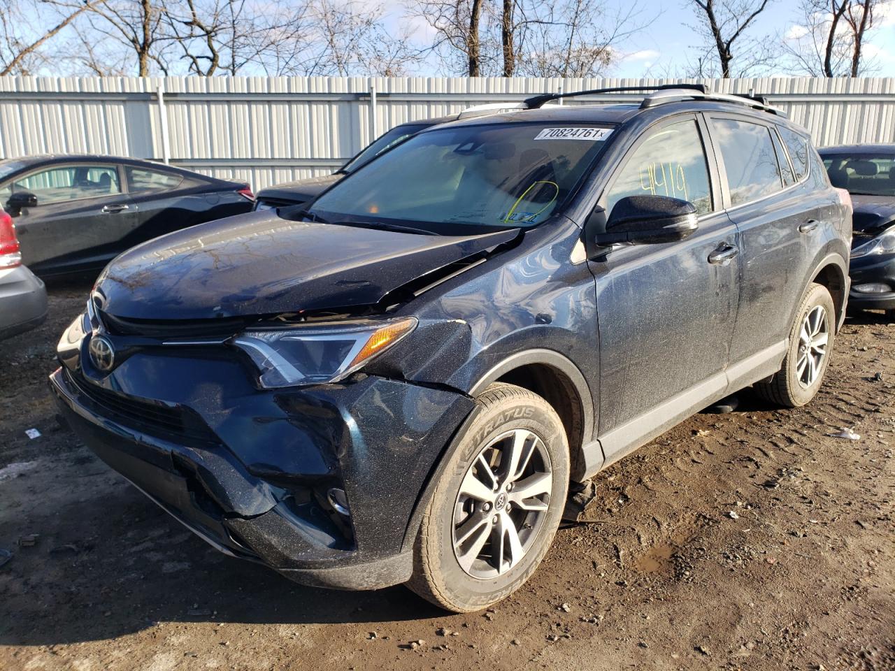 Photo 2 from auction – 2017 TOYOTA RAV4 XLE with VIN JTMRFREV1HJ708794