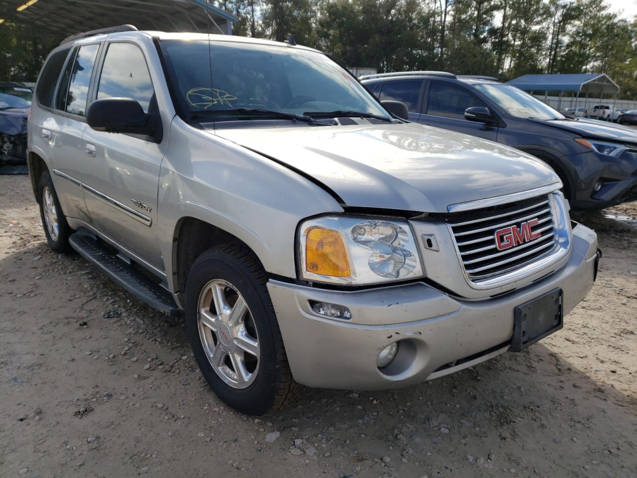 GMC ENVOY 2006 with VIN 1GKDT13S762335169 - Photo from auction