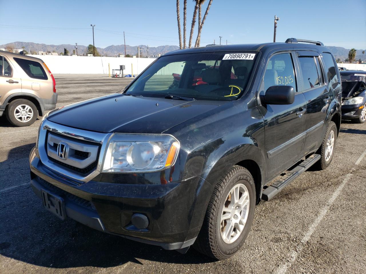 Photo 2 from auction – 2011 HONDA PILOT LX with VIN 5FNYF3H28BB056359