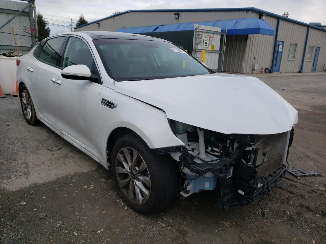 KIA OPTIMA EX 2018 with VIN 5XXGU4L39JG232029 - Photo from auction