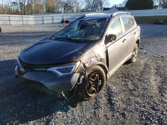 Photo 2 from auction – 2018 TOYOTA RAV4 LE with VIN JTMZFREV2JJ160004
