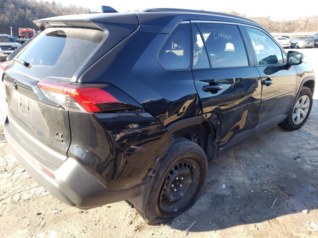 Photo 9 from auction – 2021 TOYOTA RAV4 LE with VIN 2T3G1RFV5MC185376