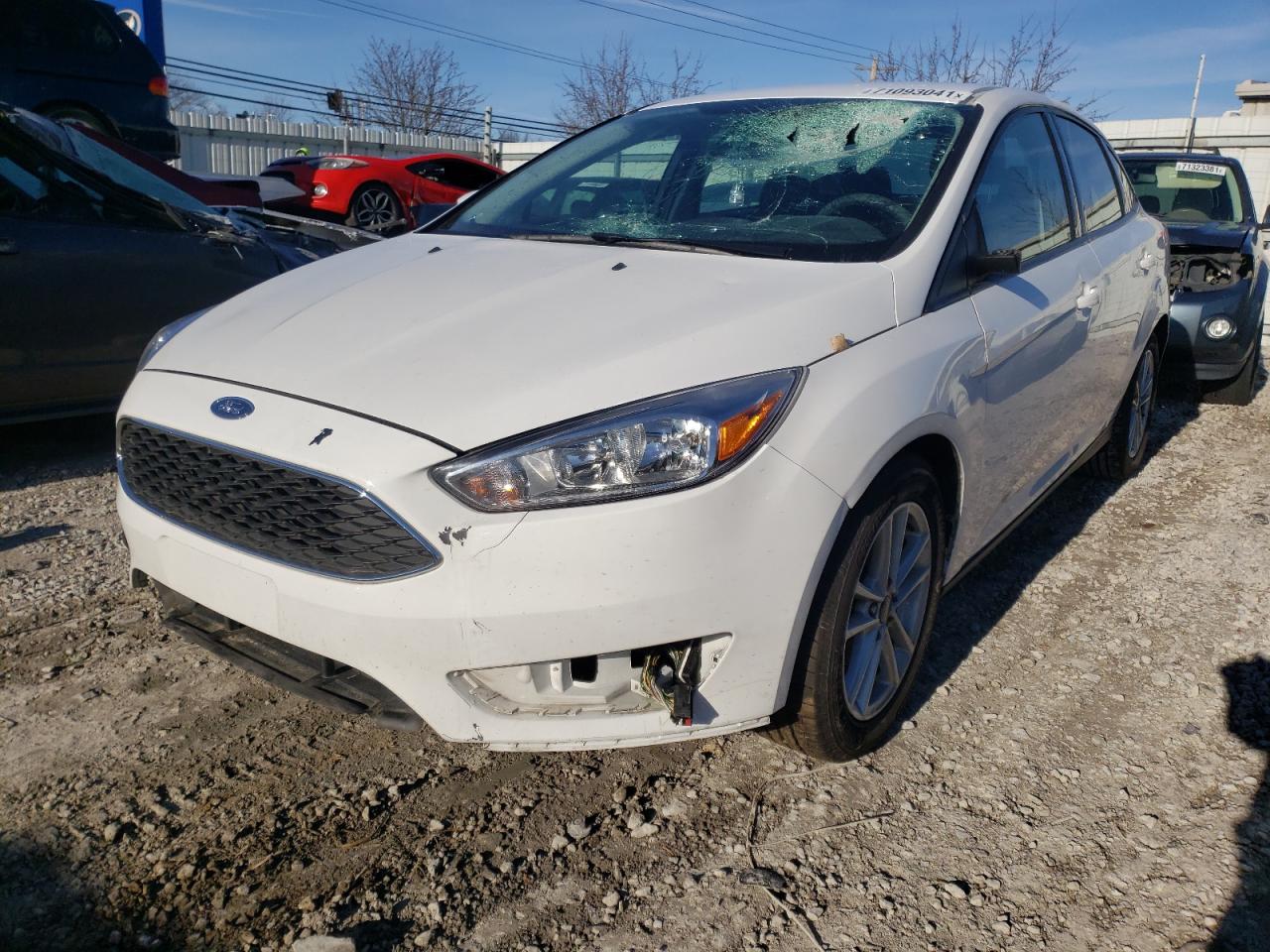 Photo 2 from auction – 2018 FORD FOCUS SE with VIN 1FADP3F21JL301583