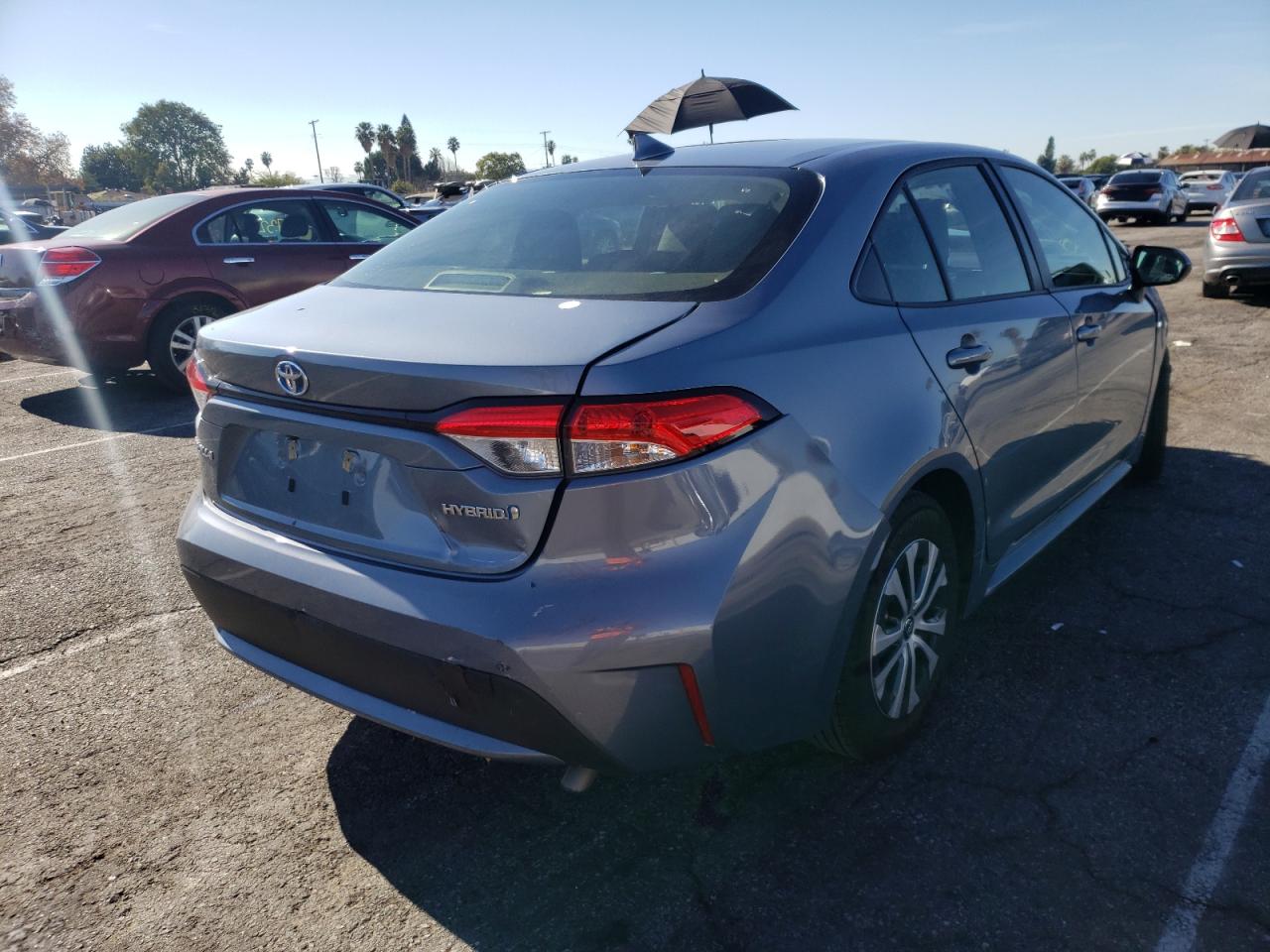 Photo 4 from auction – 2021 TOYOTA COROLLA LE with VIN JTDEAMDE5MJ027548