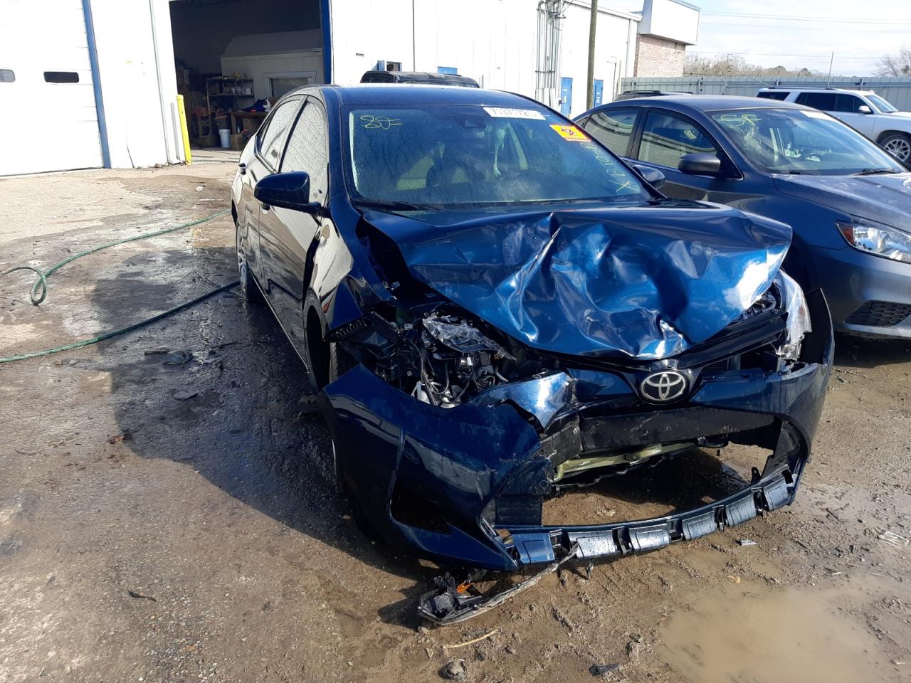 TOYOTA COROLLA L 2018 with VIN 5YFBURHE9JP824510 - Photo from auction