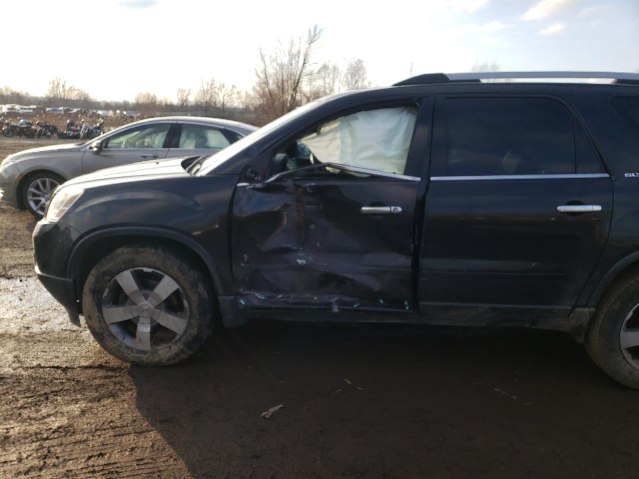 Photo 10 from auction – 2011 GMC ACADIA SLT with VIN 1GKKRREDXBJ207799