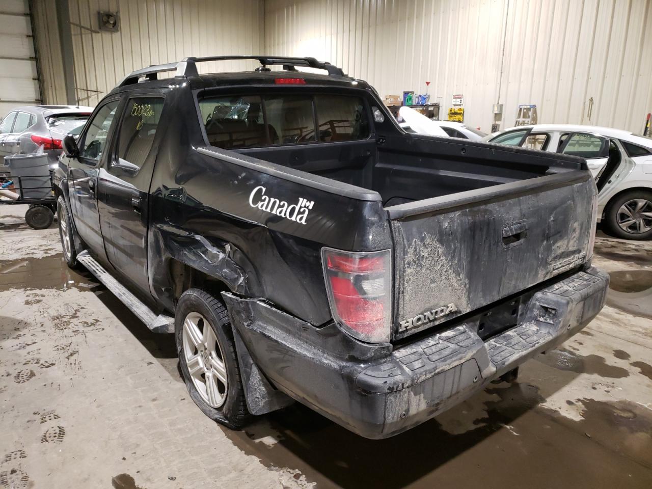 Photo 3 from auction – 2013 HONDA RIDGELINE with VIN 5FPYK1F59DB502963