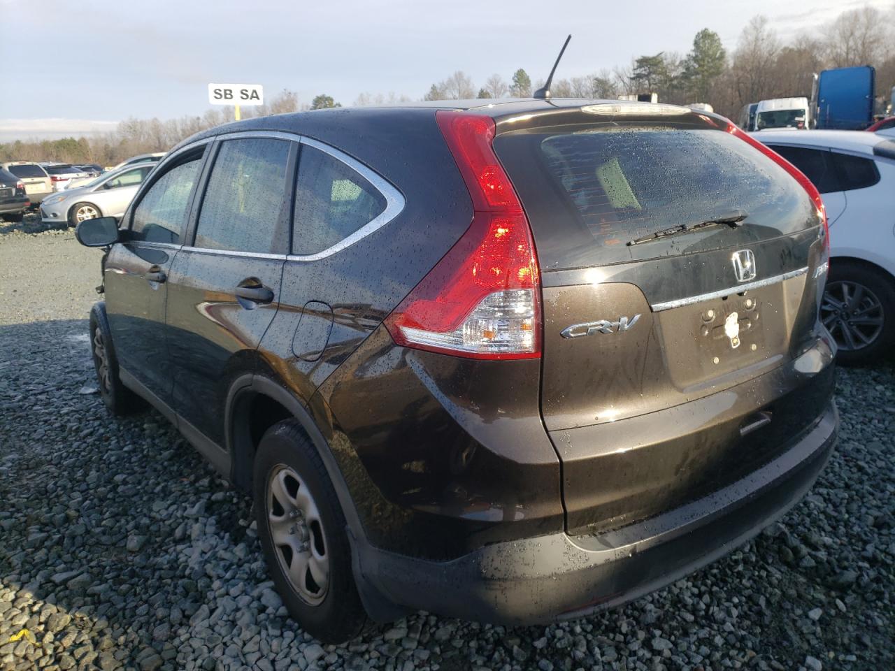 Photo 3 from auction – 2014 HONDA CR-V LX with VIN 2HKRM4H39EH674076