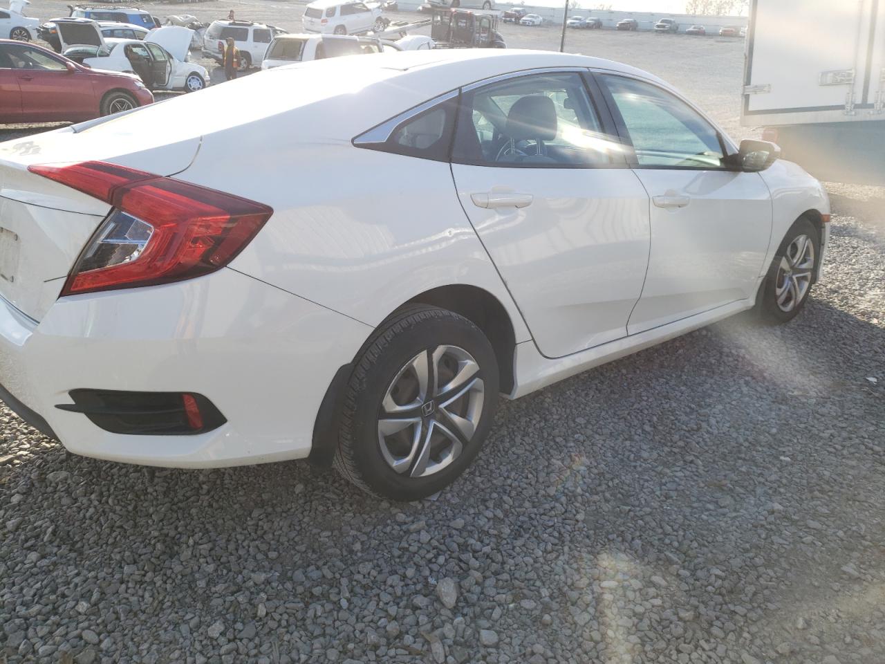 Photo 4 from auction – 2017 HONDA CIVIC LX with VIN 19XFC2F56HE001205