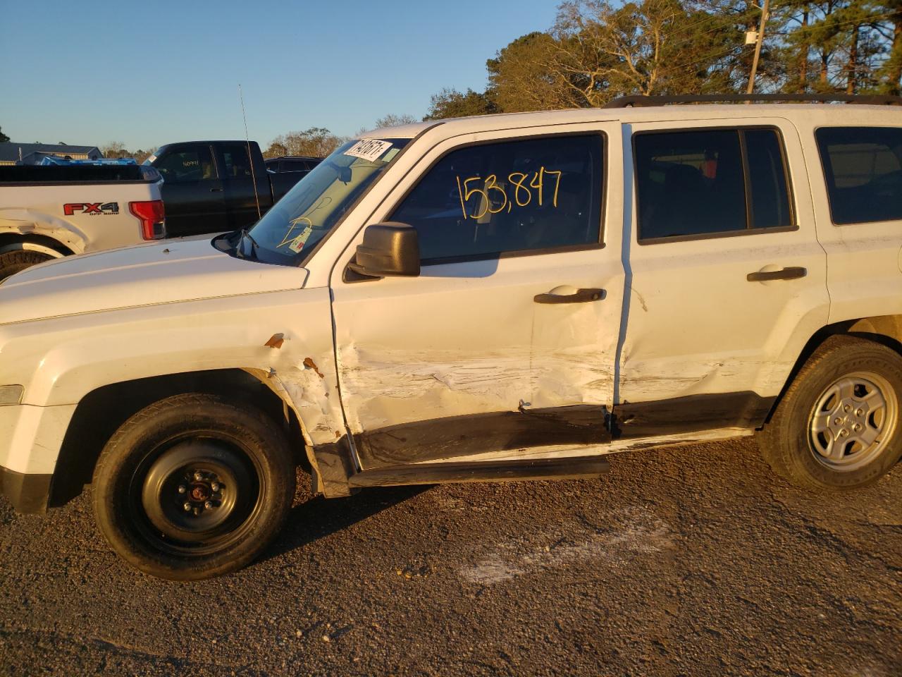 Photo 9 from auction – 2012 JEEP PATRIOT SP with VIN 1C4NJPBA8CD635000