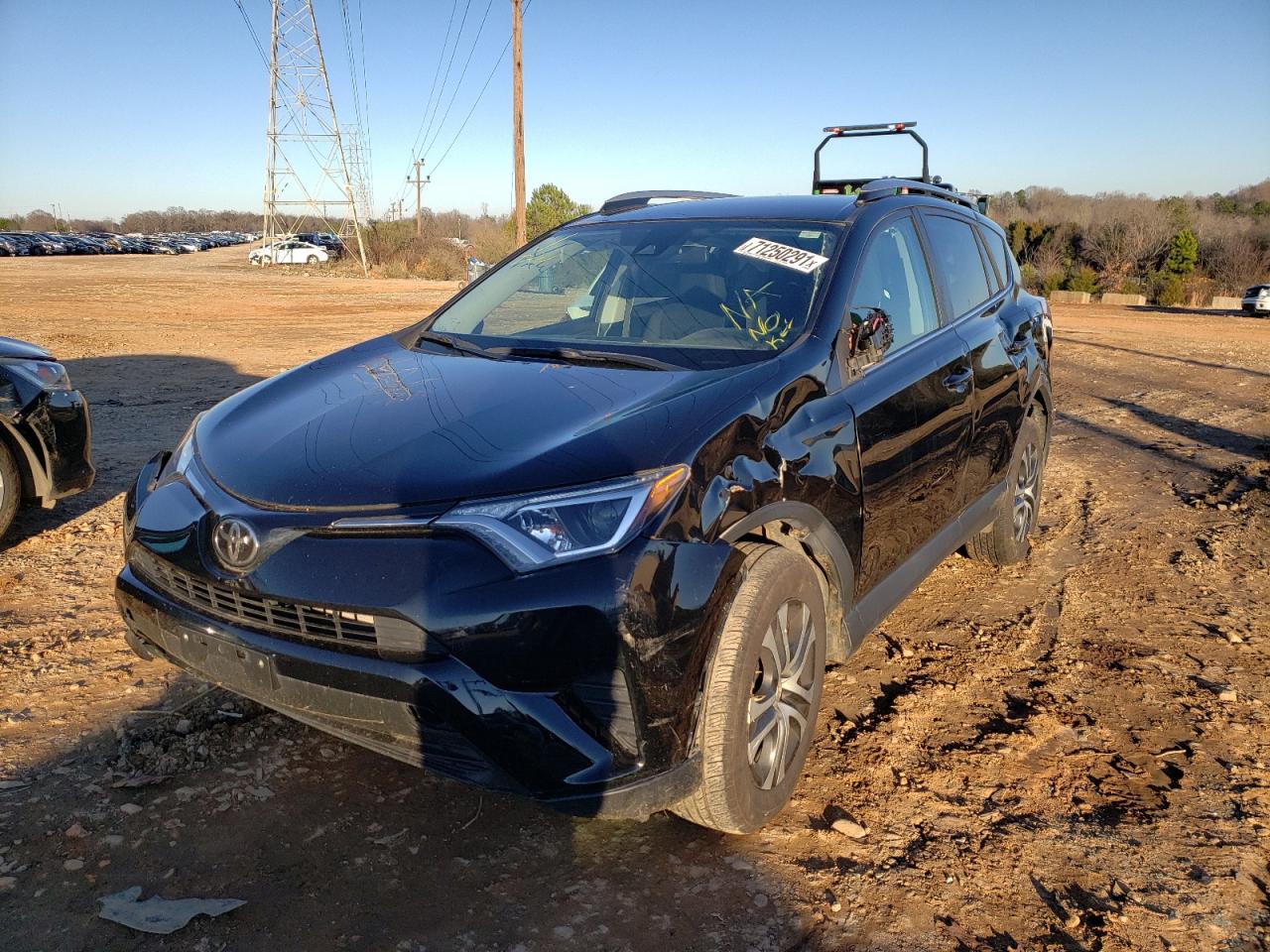 Photo 2 from auction – 2017 TOYOTA RAV4 LE with VIN 2T3BFREV4HW620938