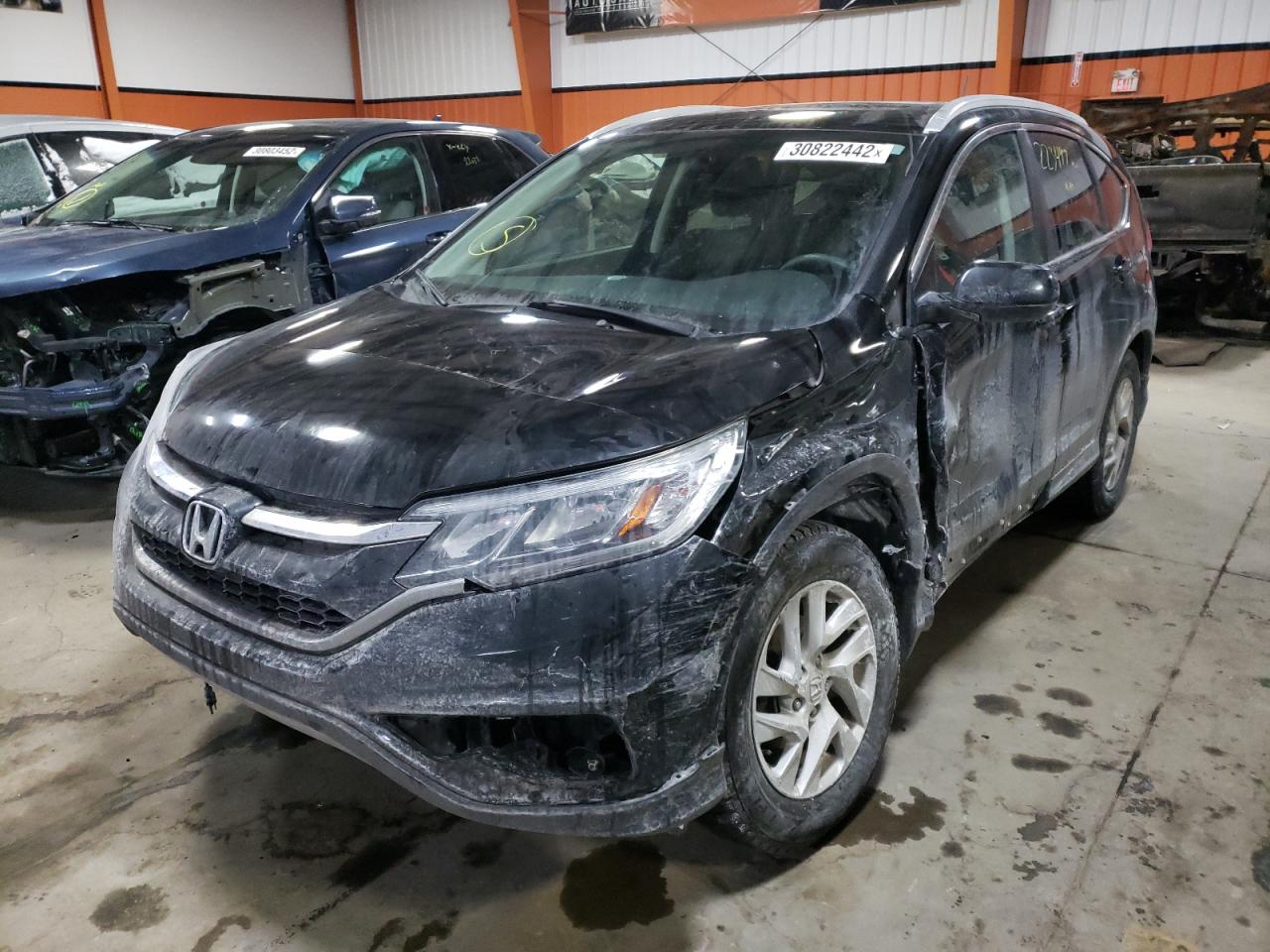 Photo 2 from auction – 2015 HONDA CR-V EX with VIN 2HKRM4H55FH122075