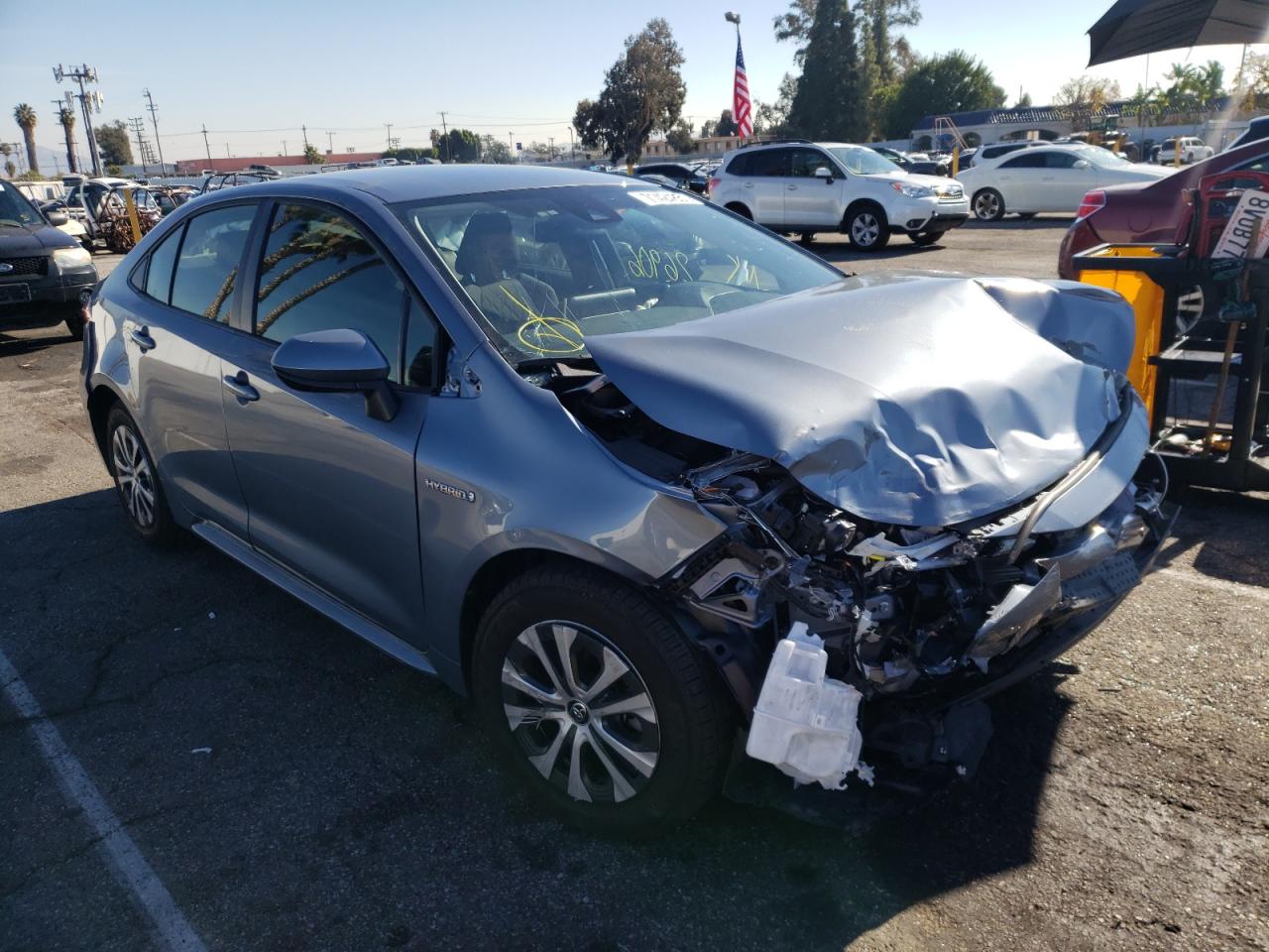 TOYOTA COROLLA LE 2021 with VIN JTDEAMDE5MJ027548 - Photo from auction