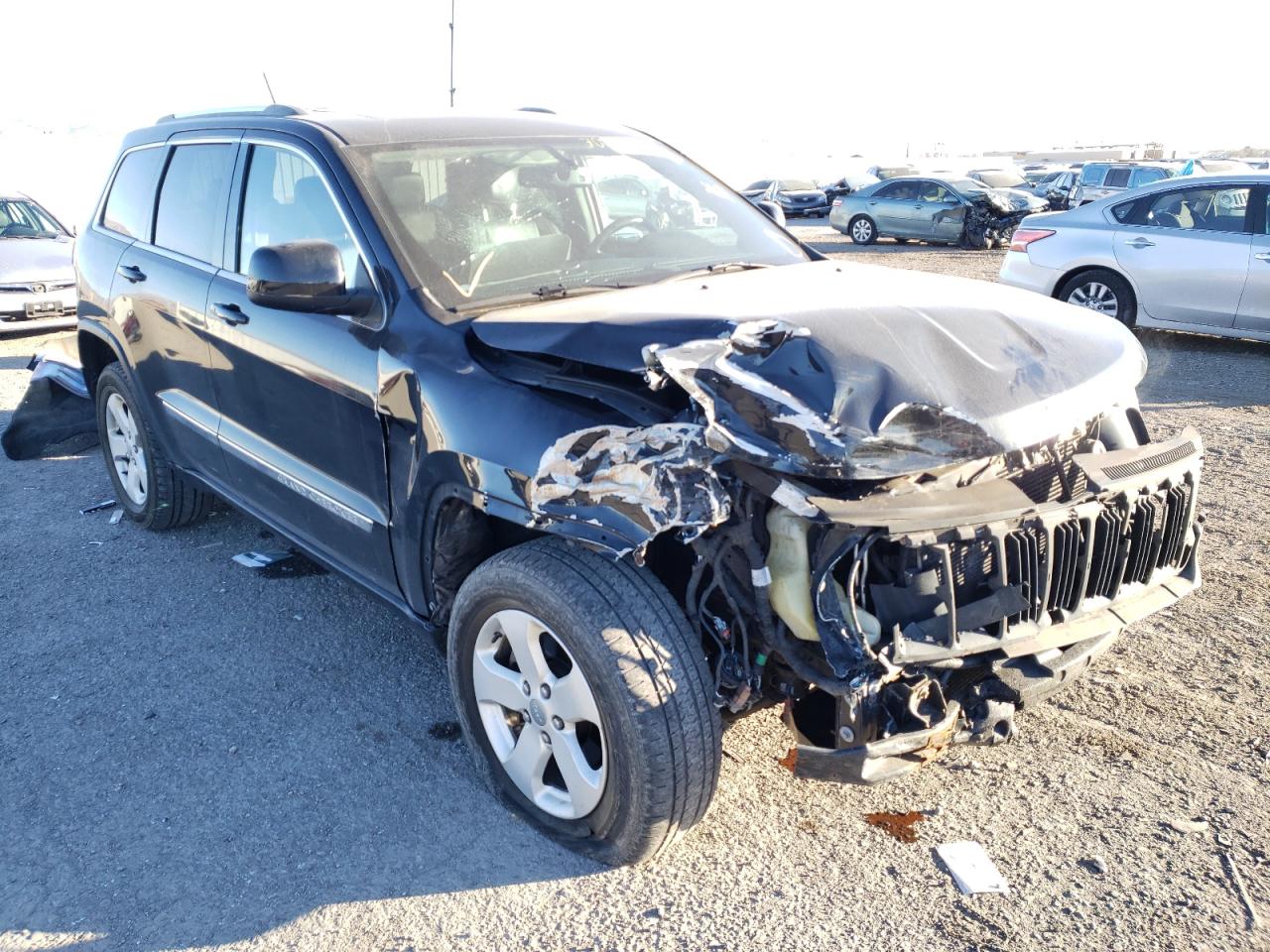 JEEP GRAND CHER 2012 with VIN 1C4RJFAG5CC201219 - Photo from auction