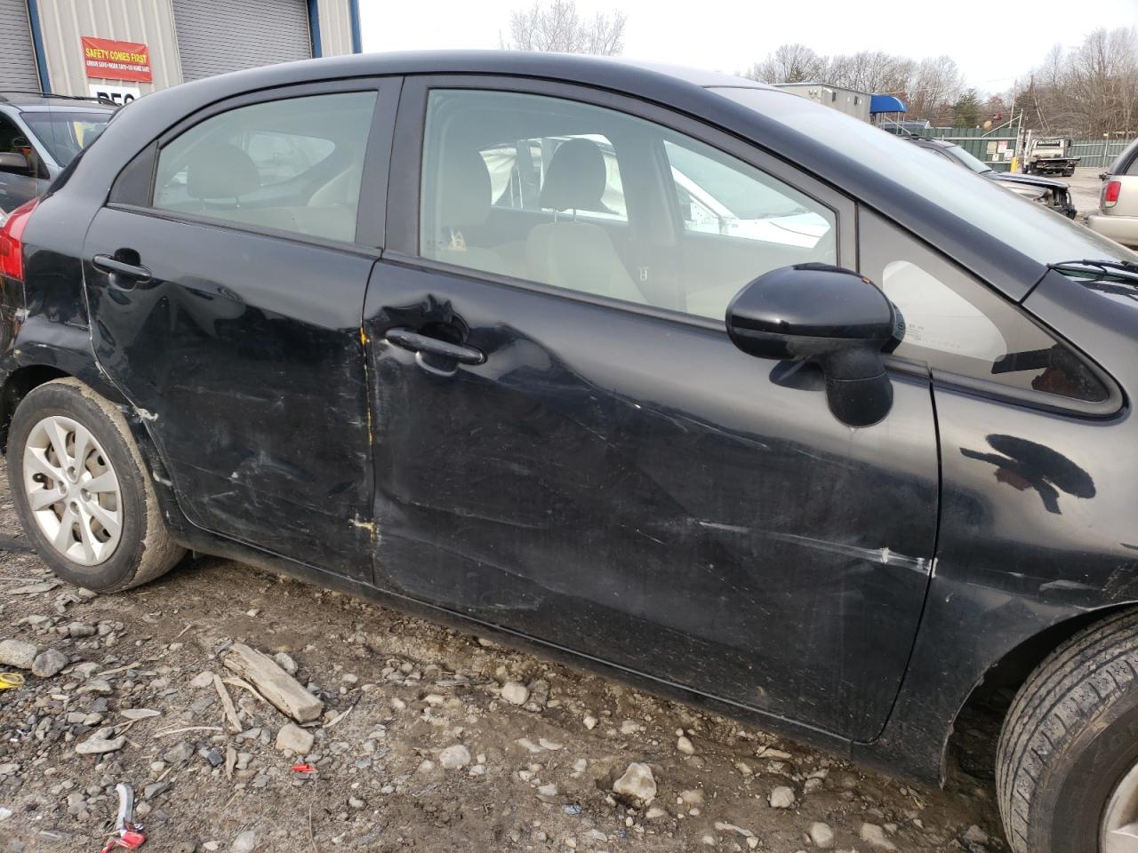 Photo 9 from auction – 2013 KIA RIO LX with VIN KNADM5A31D6182268