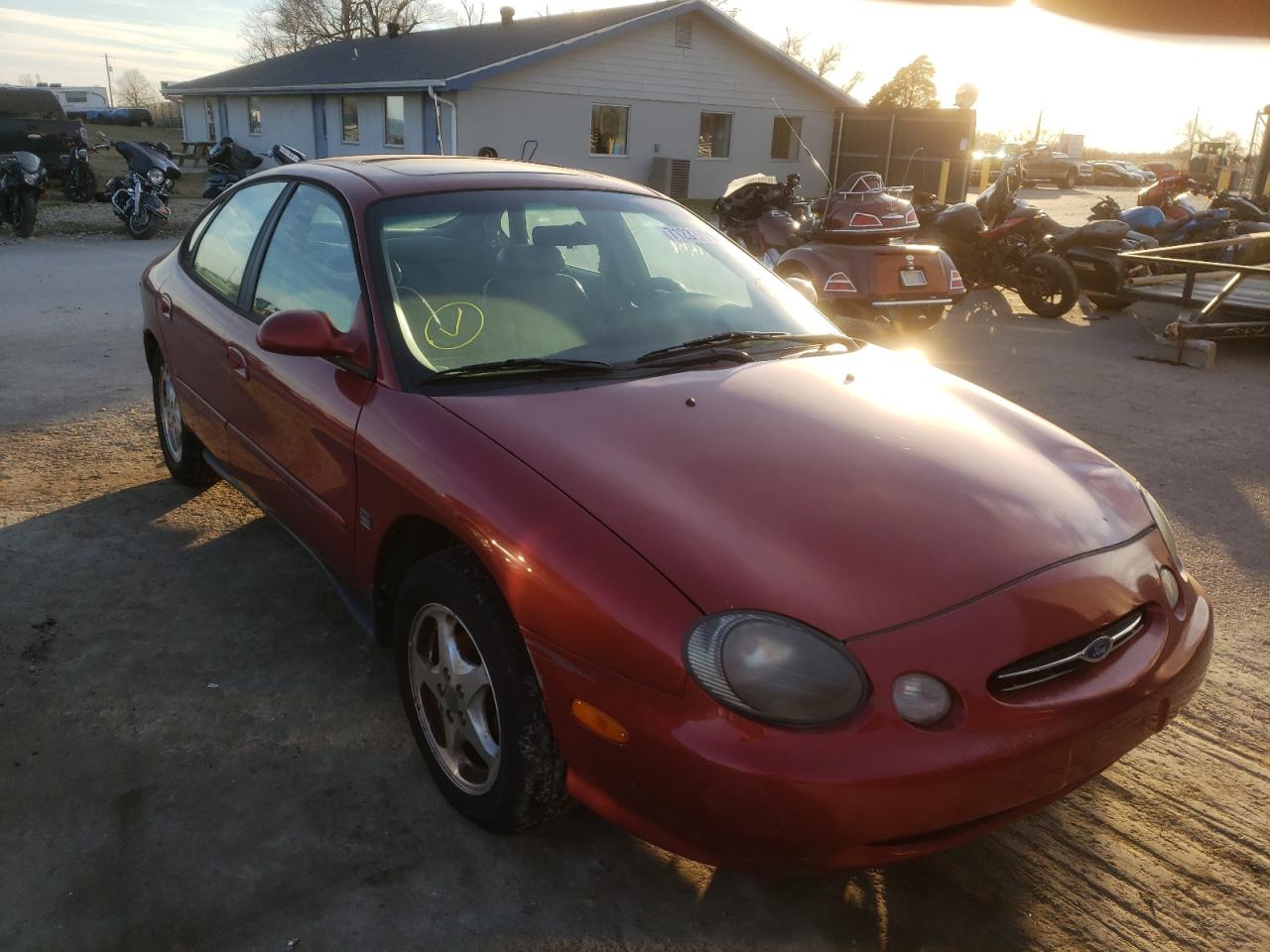 FORD TAURUS 1999 with VIN 1FAFP53S3XA265568 - Photo from auction