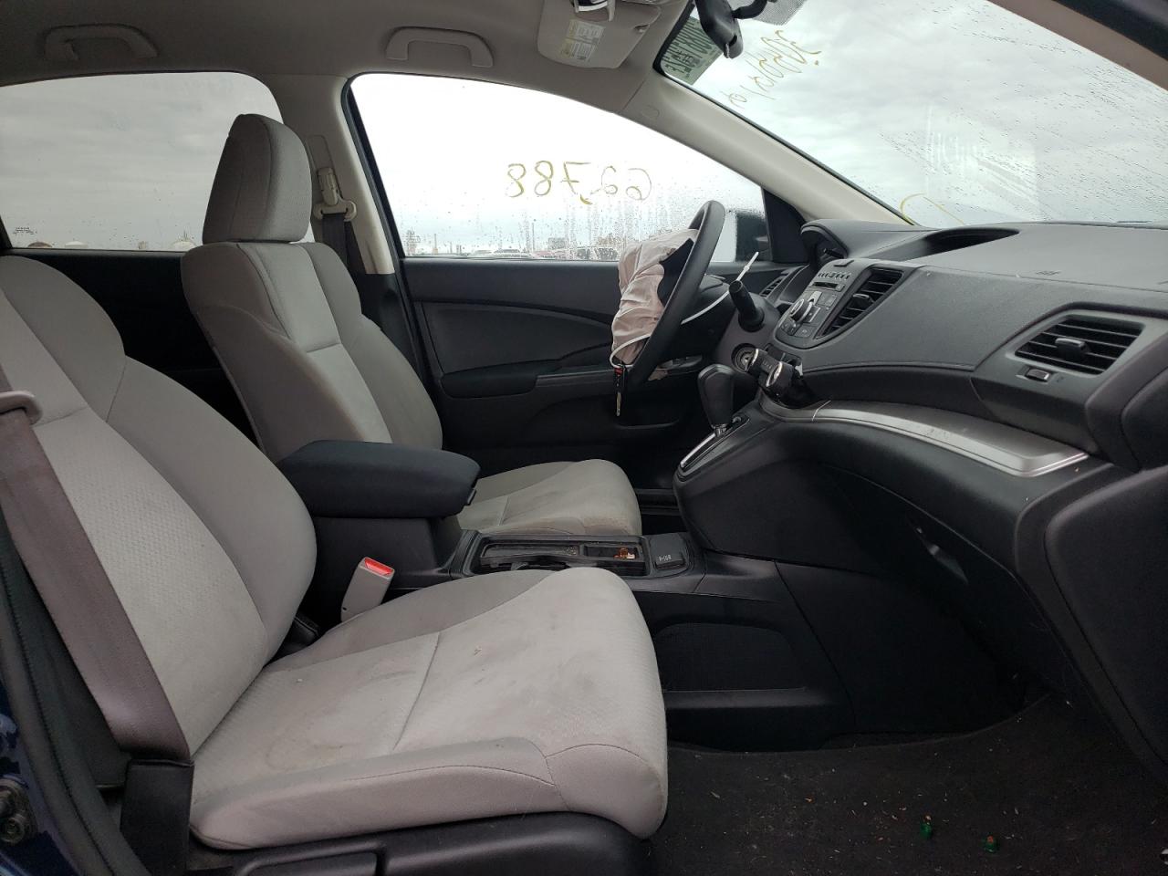 Photo 5 from auction – 2016 HONDA CR-V SE with VIN 5J6RM4H4XGL042169