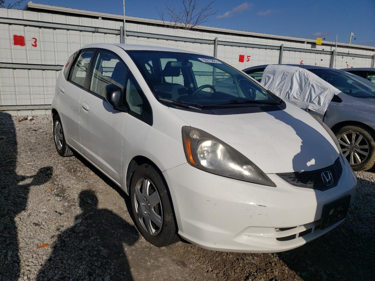 HONDA FIT 2011 with VIN JHMGE8H3XBC025243 - Photo from auction
