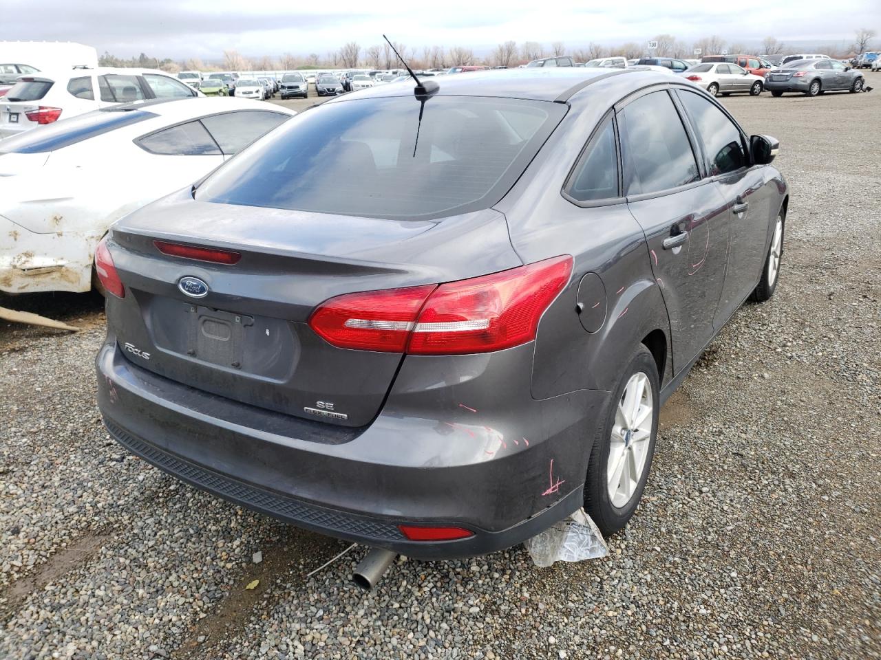 Photo 4 from auction – 2015 FORD FOCUS SE with VIN 1FADP3F2XFL270258