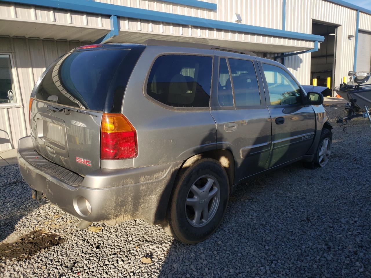 Photo 4 from auction – 2005 GMC ENVOY with VIN 1GKDS13S752172038