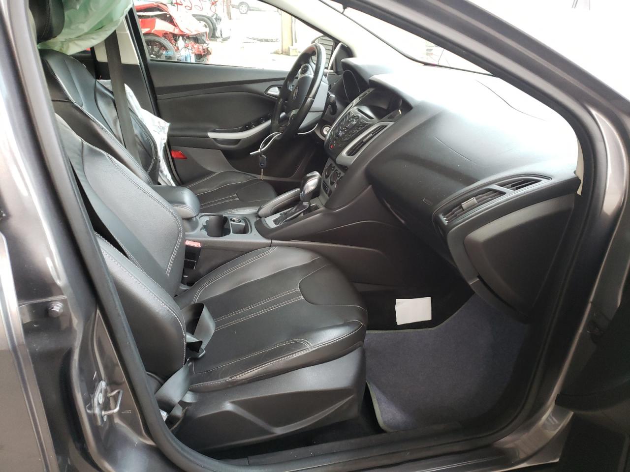 Photo 5 from auction – 2013 FORD FOCUS SE with VIN 1FADP3F20DL148764