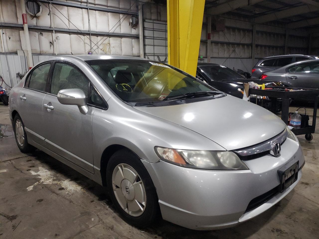 HONDA CIVIC HYBR 2006 with VIN JHMFA36206S028443 - Photo from auction