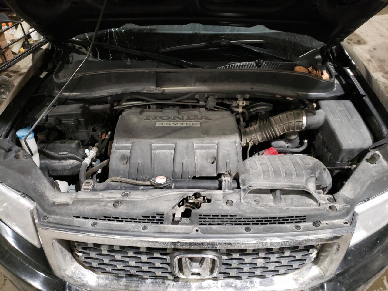 Photo 7 from auction – 2013 HONDA RIDGELINE with VIN 5FPYK1F59DB502963