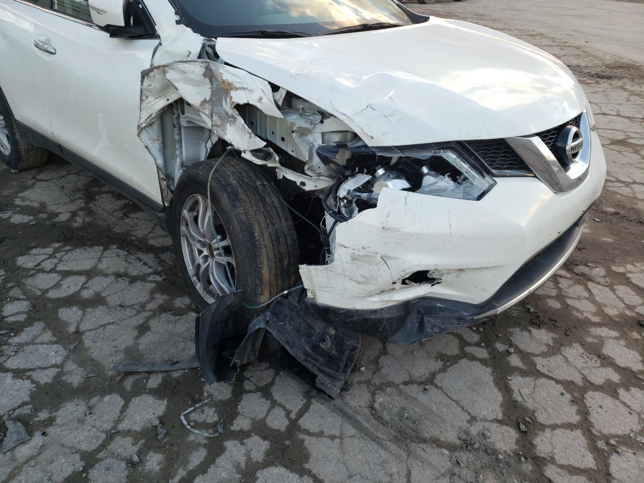 Photo 9 from auction – 2014 NISSAN ROGUE S with VIN 5N1AT2MV5EC868364