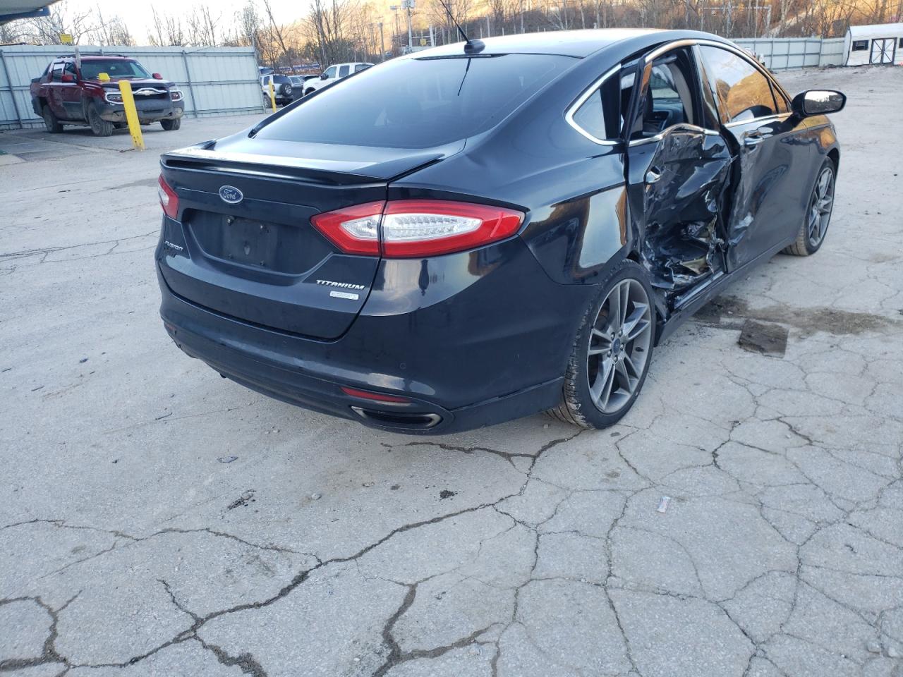 Photo 4 from auction – 2016 FORD FUSION TIT with VIN 3FA6P0K95GR238704