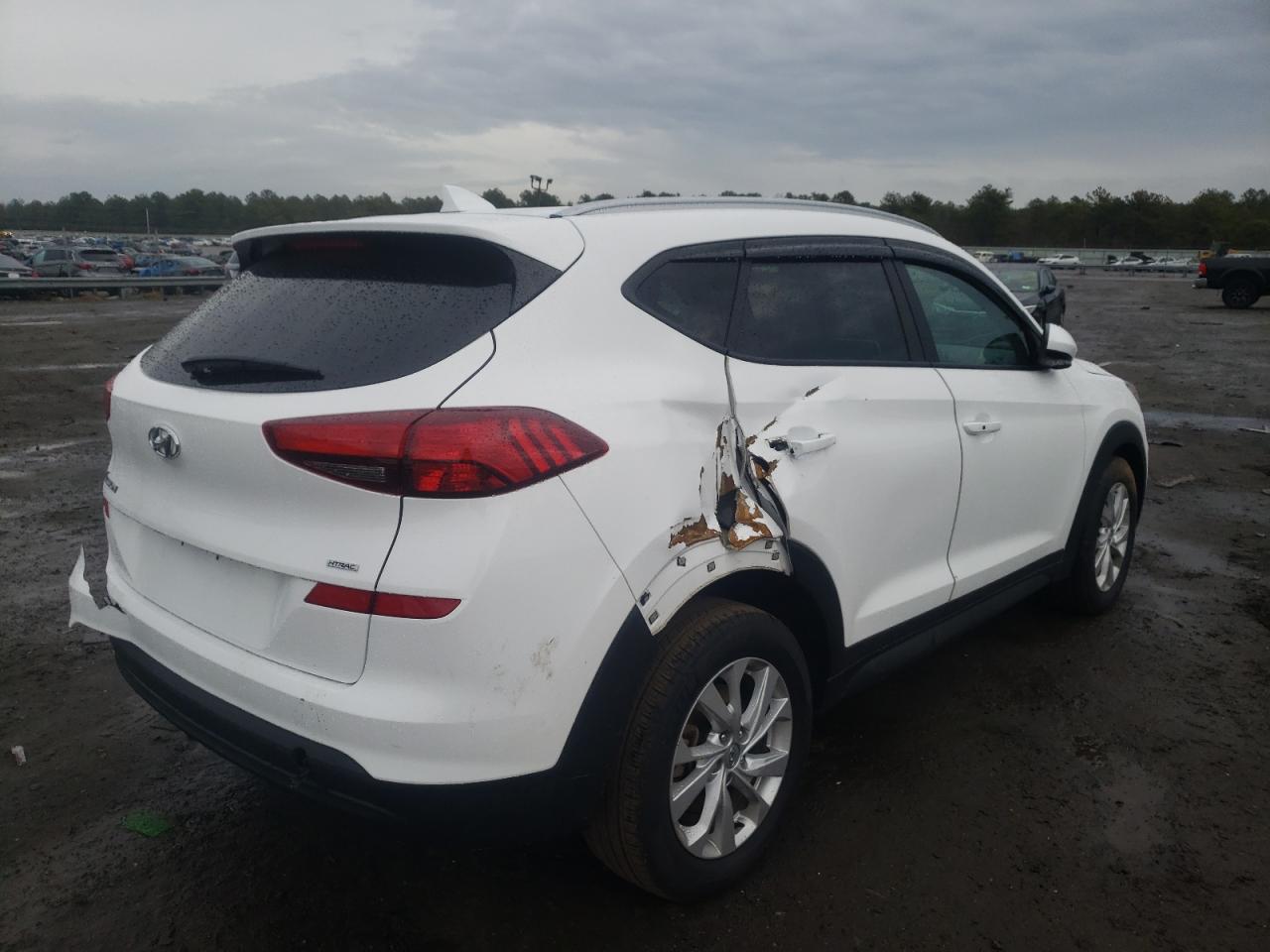 Photo 4 from auction – 2020 HYUNDAI TUCSON LIM with VIN KM8J3CA43LU126070