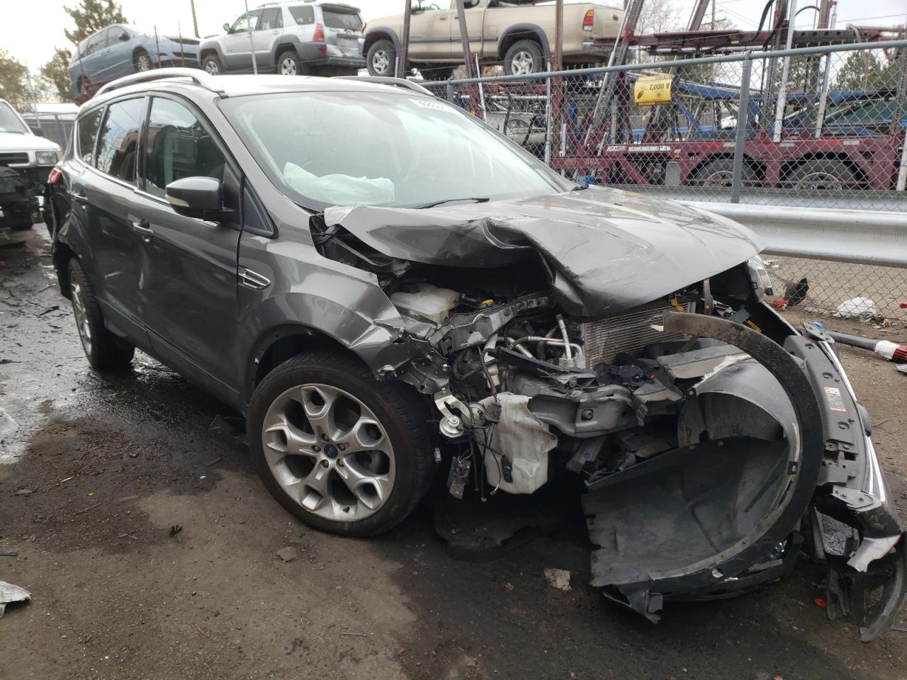 FORD ESCAPE TIT 2014 with VIN 1FMCU0JX9EUD92002 - Photo from auction