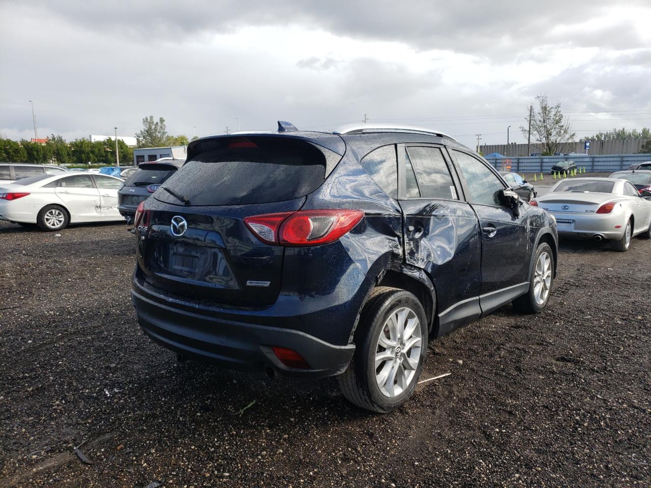 Photo 4 from auction – 2015 MAZDA CX-5 GT with VIN JM3KE2DY0F0492020