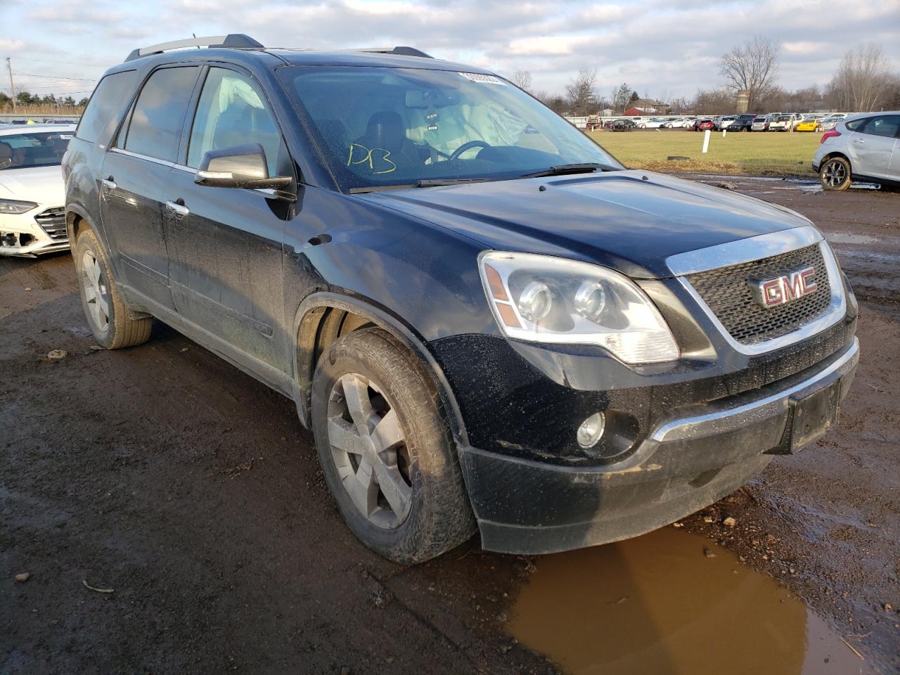 GMC ACADIA SLT 2011 with VIN 1GKKRREDXBJ207799 - Photo from auction