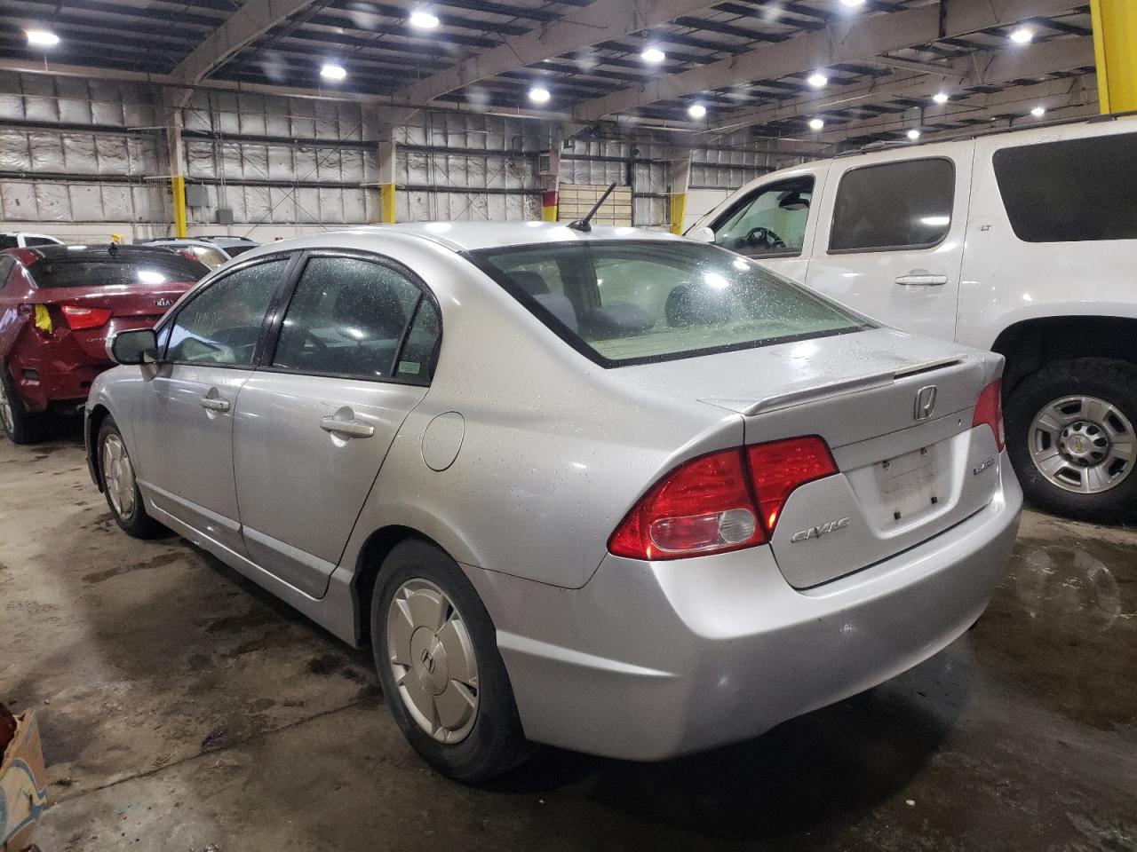 Photo 3 from auction – 2006 HONDA CIVIC HYBR with VIN JHMFA36206S028443
