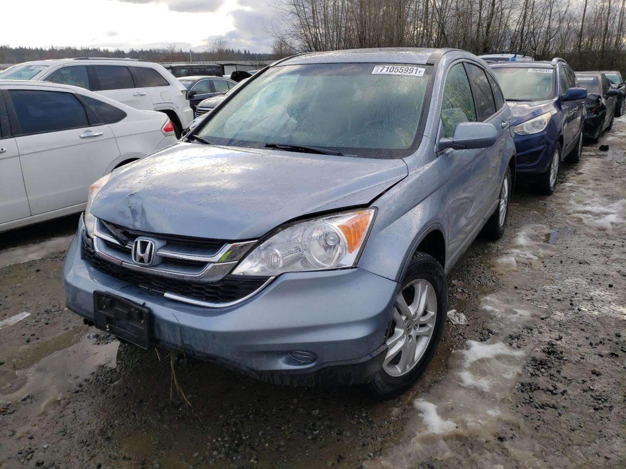 Photo 2 from auction – 2011 HONDA CR-V EXL with VIN JHLRE4H71BC017489