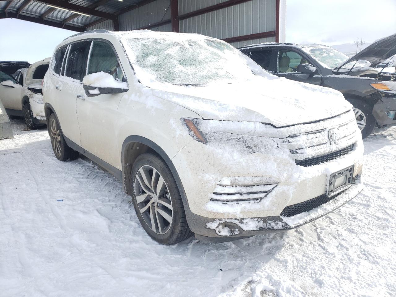 Photo 1 from auction – 2016 HONDA PILOT TOUR with VIN 5FNYF6H92GB039479