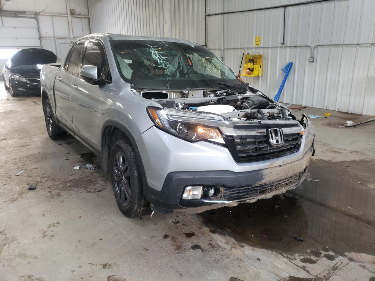 HONDA RIDGELINE 2019 with VIN 5FPYK3F1XKB027927 - Photo from auction