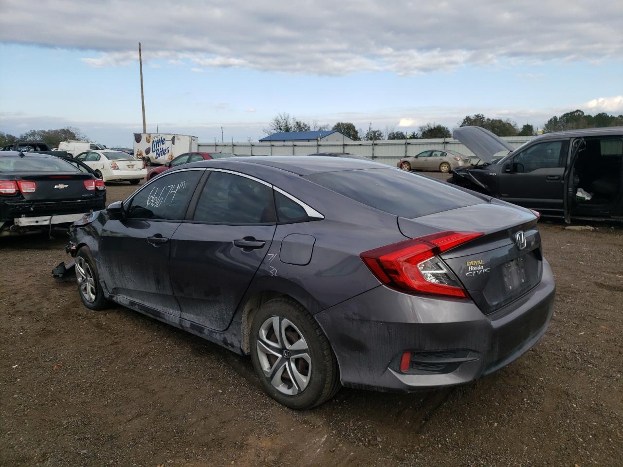 Photo 3 from auction – 2017 HONDA CIVIC LX with VIN 19XFC2F54HE023669