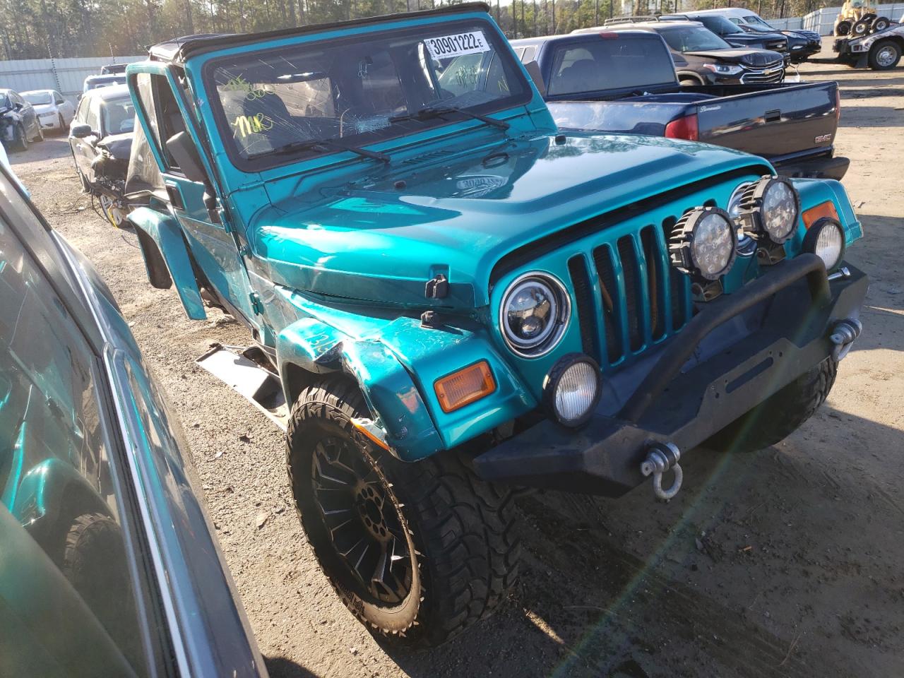 JEEP WRANGLER / 2000 with VIN 1J4FA59SXYP705149 - Photo from auction