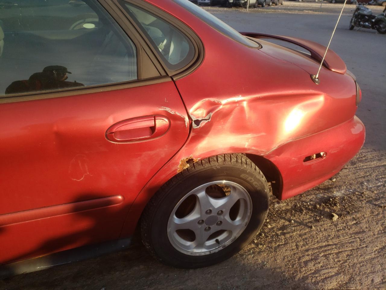 Photo 9 from auction – 1999 FORD TAURUS with VIN 1FAFP53S3XA265568