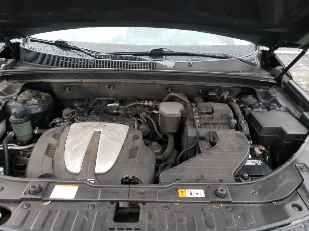 Photo 7 from auction – 2013 KIA SORENTO SX with VIN 5XYKWDA24DG354750