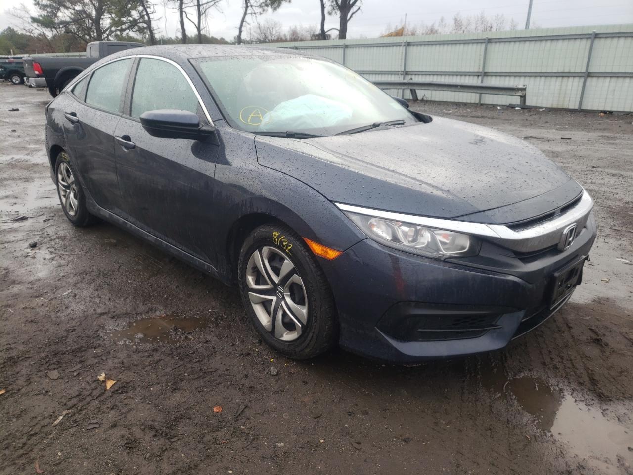 HONDA CIVIC LX 2018 with VIN 2HGFC2F5XJH567976 - Photo from auction