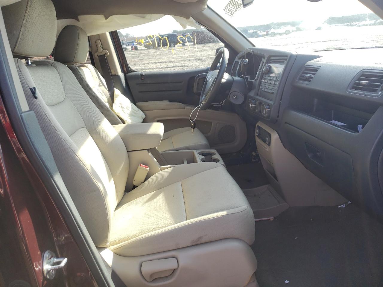 Photo 5 from auction – 2013 HONDA RIDGELINE with VIN 5FPYK1F21DB016833