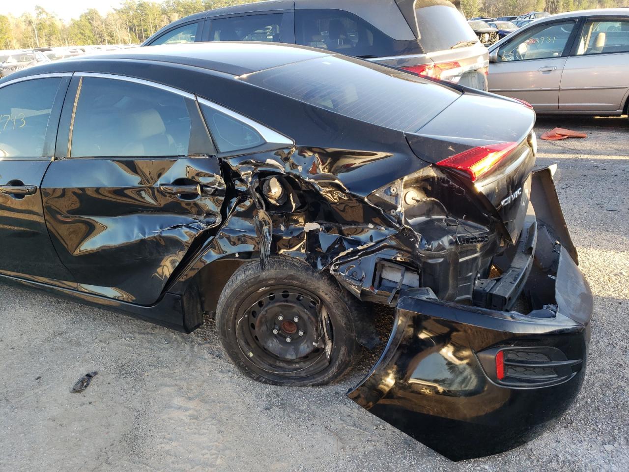 Photo 9 from auction – 2016 HONDA CIVIC LX with VIN 19XFC2F51GE044462