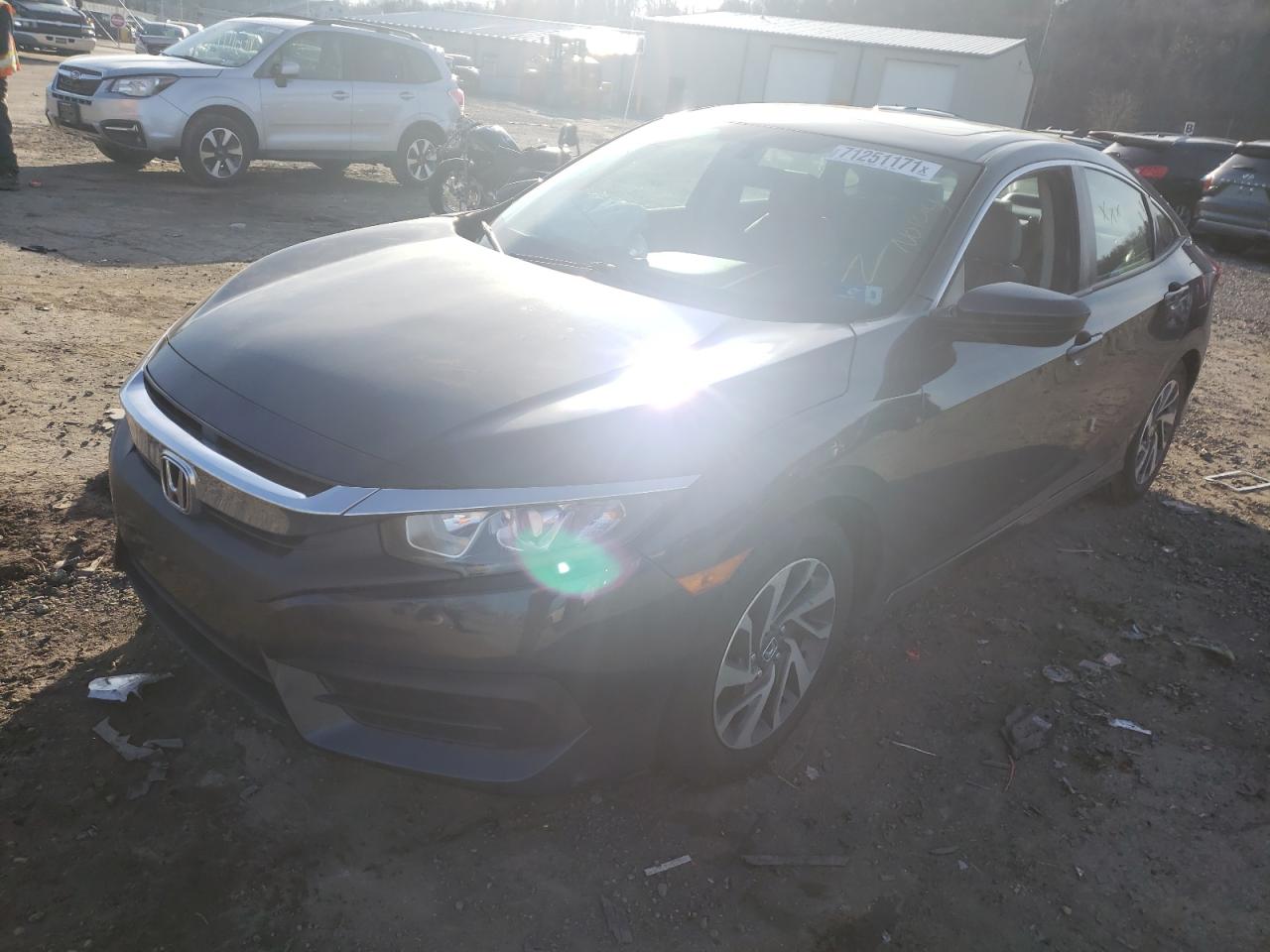Photo 2 from auction – 2017 HONDA CIVIC EX with VIN 2HGFC2F71HH505832
