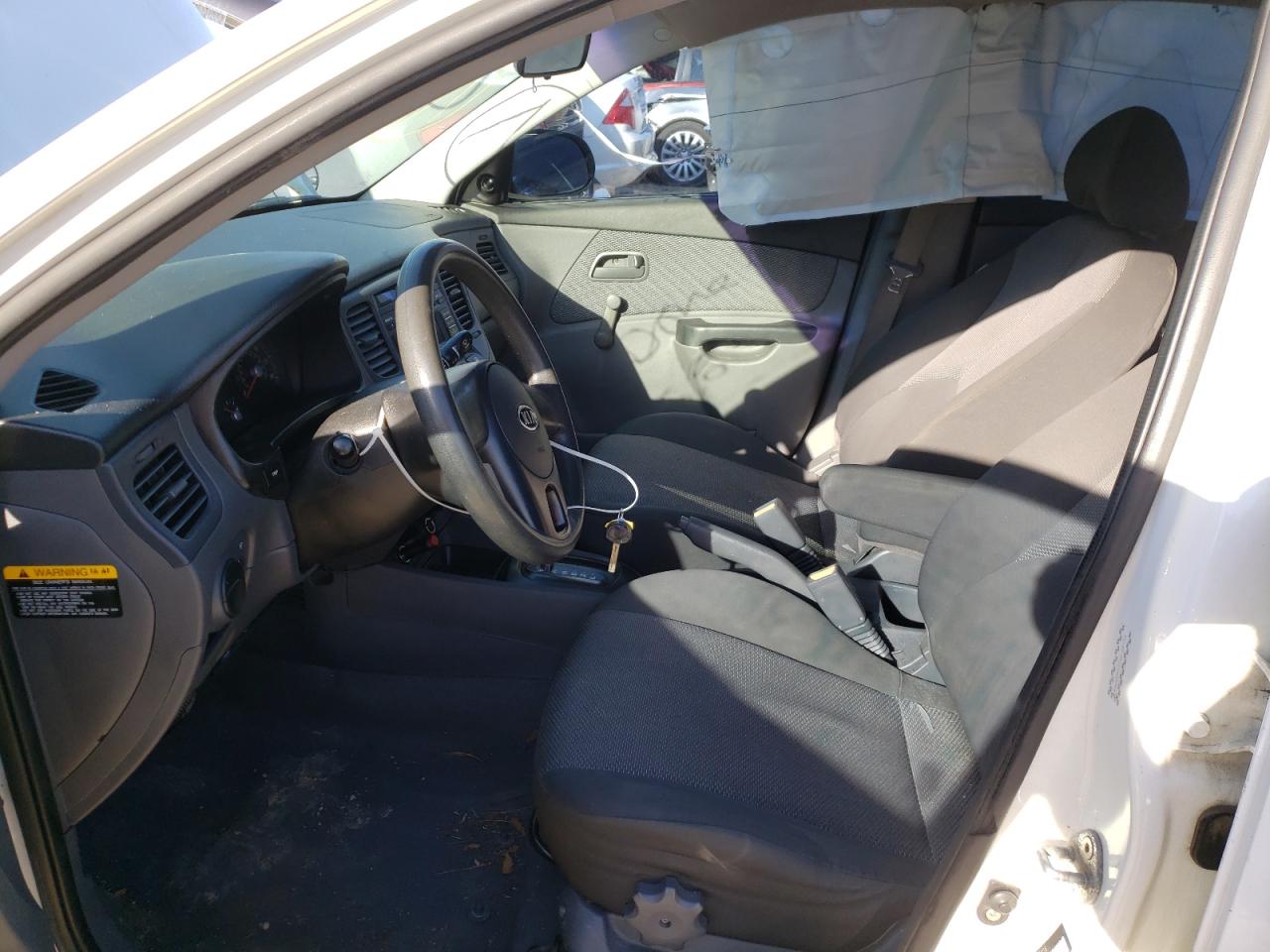 Photo 5 from auction – 2010 KIA RIO LX with VIN KNADH4A39A6628158