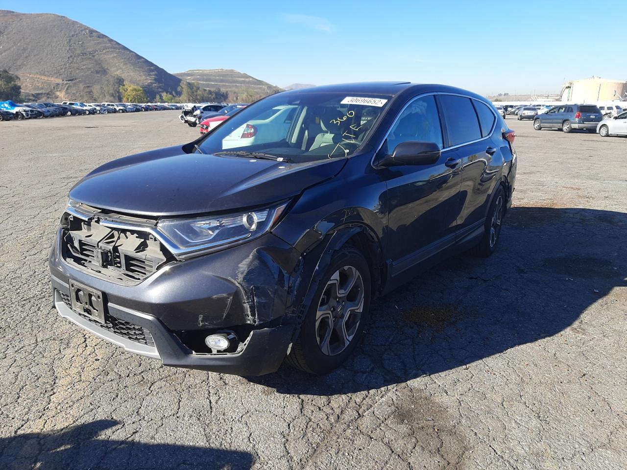 Photo 2 from auction – 2017 HONDA CR-V EX with VIN 7FARW1H57HE014975