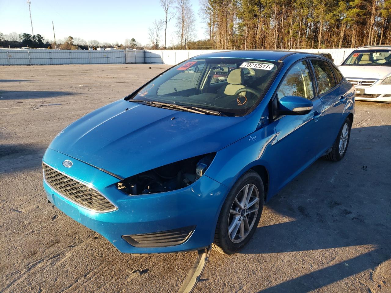 Photo 2 from auction – 2015 FORD FOCUS SE with VIN 1FADP3F26FL252386