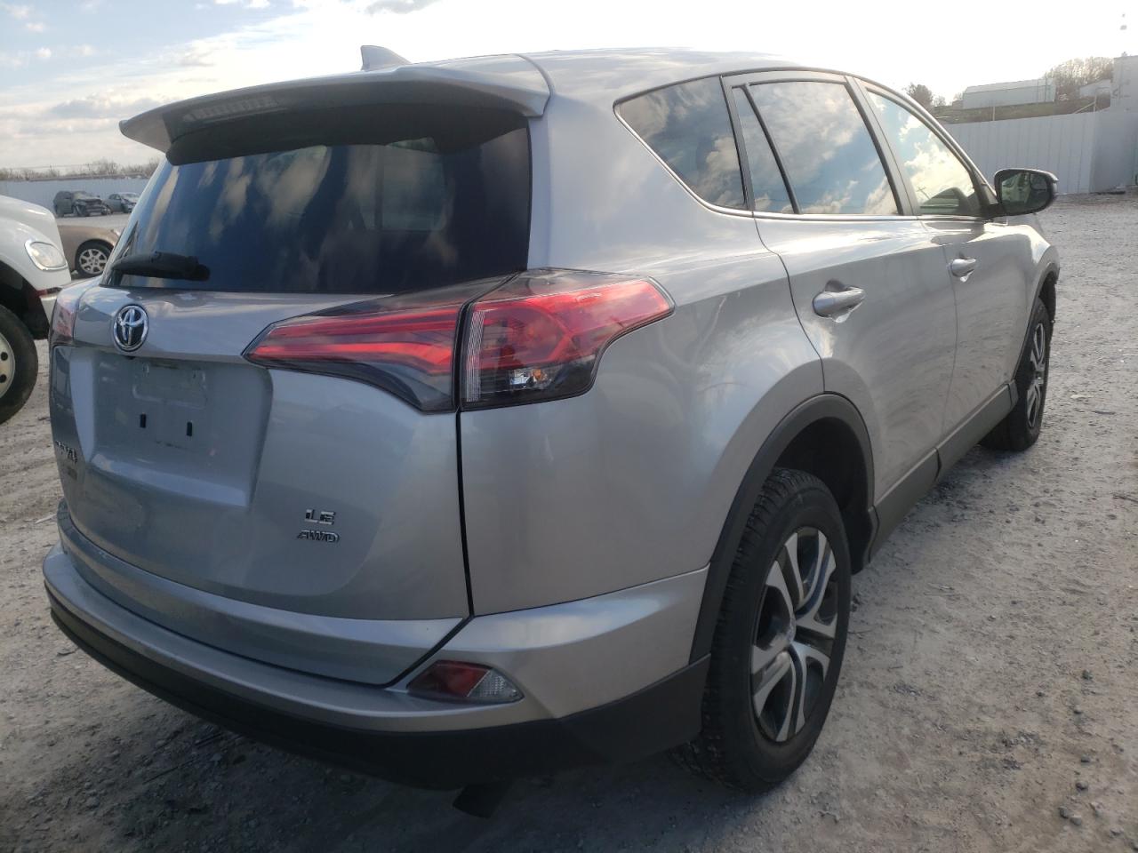 Photo 4 from auction – 2018 TOYOTA RAV4 LE with VIN JTMBFREV0JJ208133
