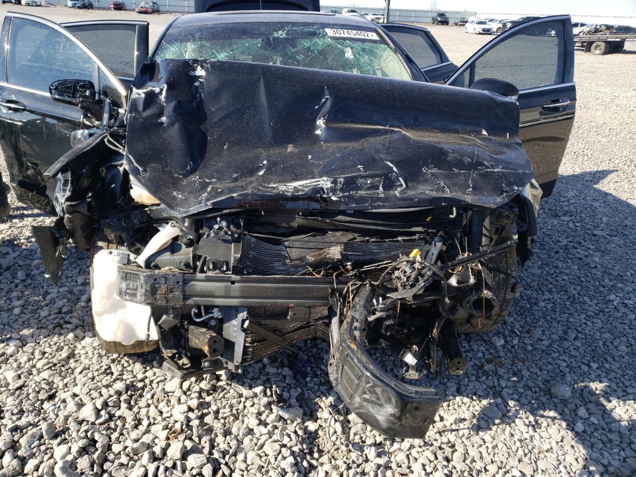 Photo 7 from auction – 2018 FORD FUSION TIT with VIN 3FA6P0RU3JR283304